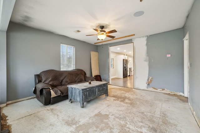 living room featuring ceiling fan