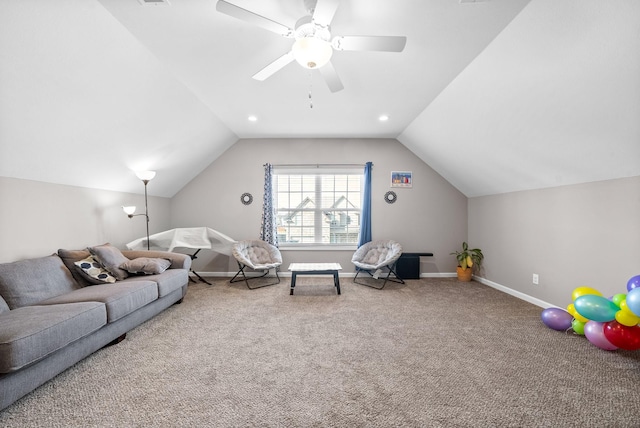 carpeted living room with ceiling fan and lofted ceiling