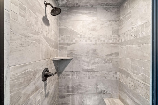 room details with a tile shower