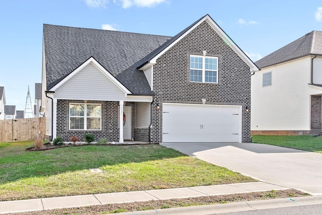 view of property with a garage and a front yard