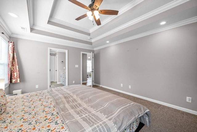 bedroom featuring a raised ceiling, ceiling fan, and ornamental molding