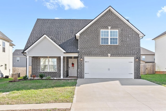 front of property featuring cooling unit, a front yard, and a garage