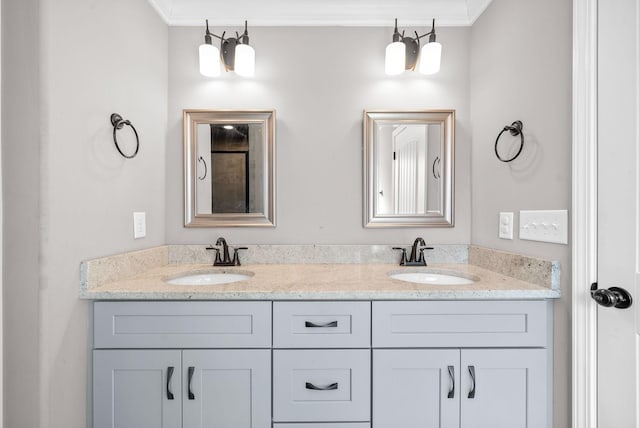 bathroom featuring vanity and crown molding