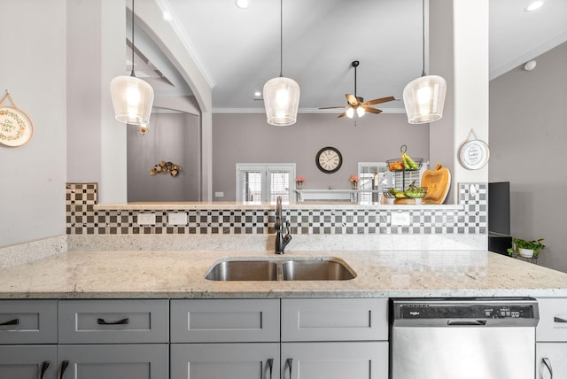 kitchen with dishwasher, sink, backsplash, crown molding, and gray cabinets