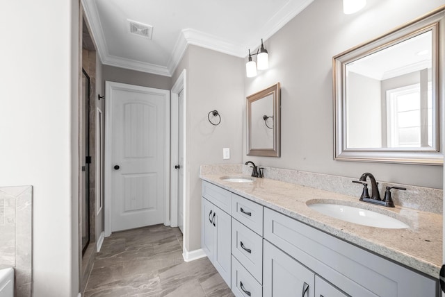 bathroom with vanity and ornamental molding