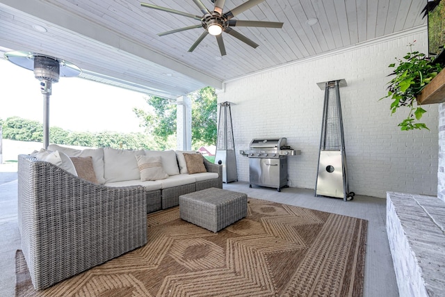 view of patio featuring outdoor lounge area, ceiling fan, and a grill