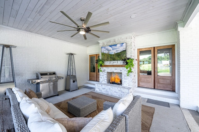 view of patio featuring an outdoor living space with a fireplace, french doors, ceiling fan, and a grill