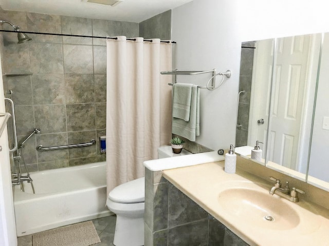 full bathroom featuring sink, tile patterned floors, toilet, and shower / bath combo