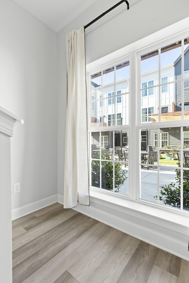 unfurnished living room featuring light hardwood / wood-style floors