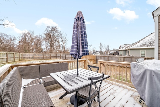 wooden terrace featuring grilling area