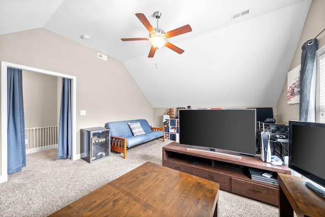 interior space with light carpet, ceiling fan, and lofted ceiling