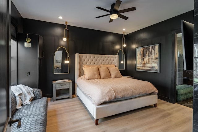 bedroom featuring ceiling fan and light hardwood / wood-style floors