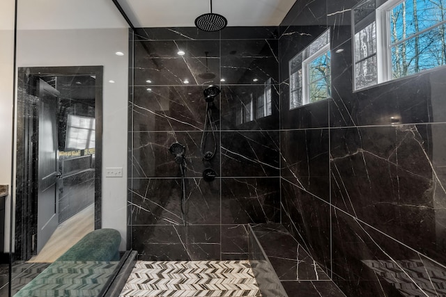 bathroom featuring tiled shower