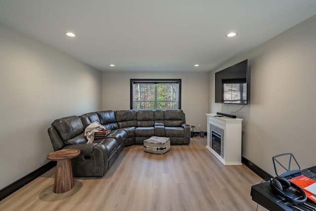 living room with light hardwood / wood-style floors