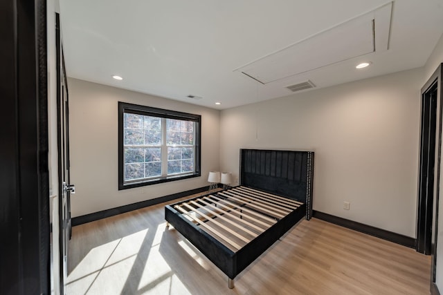 bedroom with light wood-type flooring