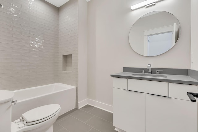 full bathroom featuring tile patterned floors, toilet, vanity, and baseboards