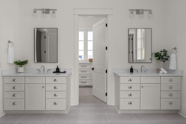 bathroom featuring tile patterned floors and vanity