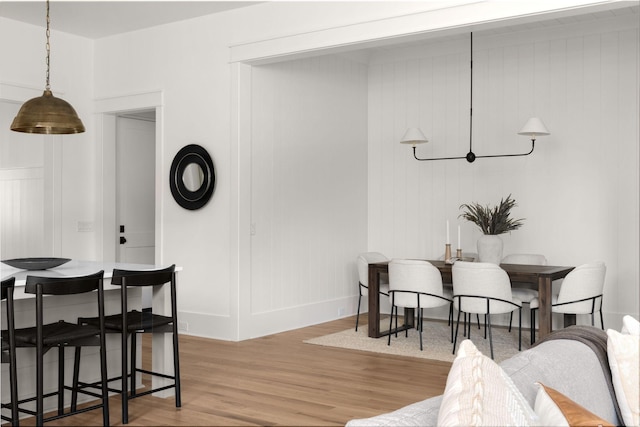 dining room with wood-type flooring