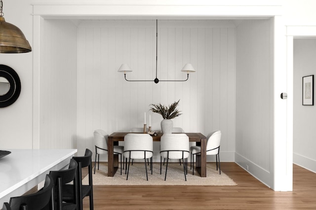 dining space featuring hardwood / wood-style floors