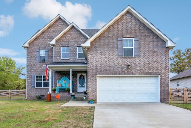 front facade with a garage and a front yard