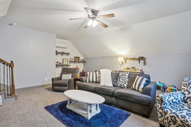 living room with carpet, ceiling fan, a wall unit AC, and vaulted ceiling