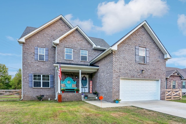 view of front of home with a garage and a front lawn