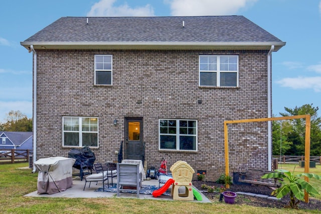 back of house featuring a patio