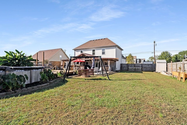 view of yard with a gazebo and a shed