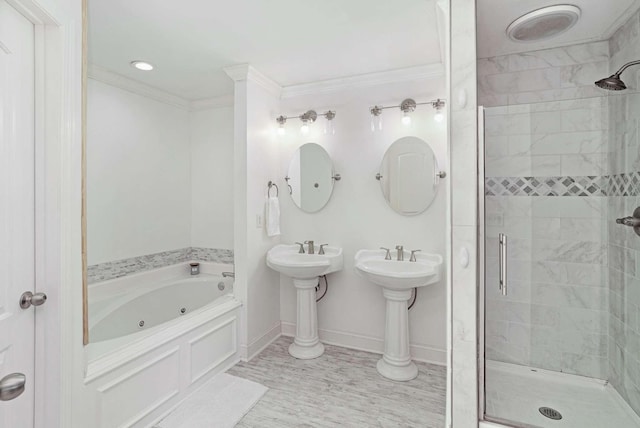 bathroom featuring separate shower and tub and ornamental molding