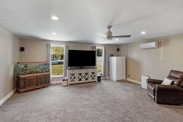 living room with carpet flooring, a wall unit AC, and ceiling fan