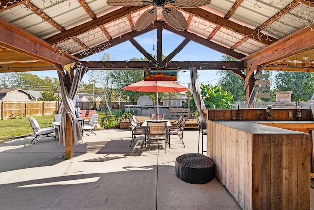 view of patio with a gazebo and ceiling fan