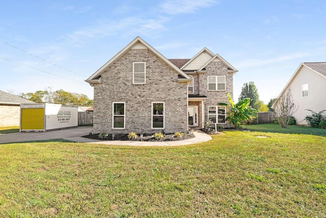 view of front of property with a front lawn