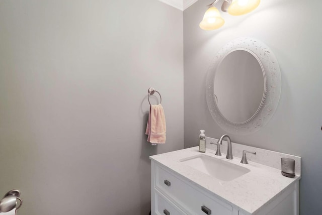 bathroom featuring vanity and crown molding