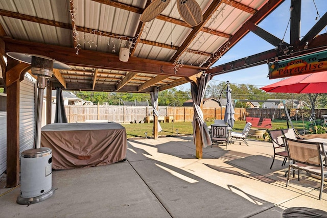 view of patio with ceiling fan