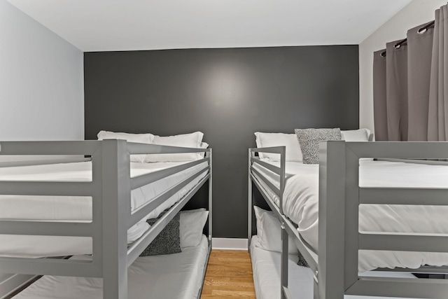 bedroom featuring hardwood / wood-style flooring