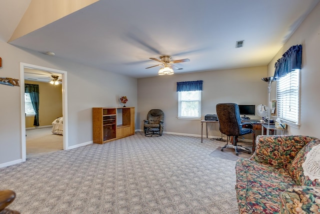 home office featuring ceiling fan and light colored carpet