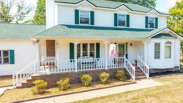 view of front of property featuring covered porch