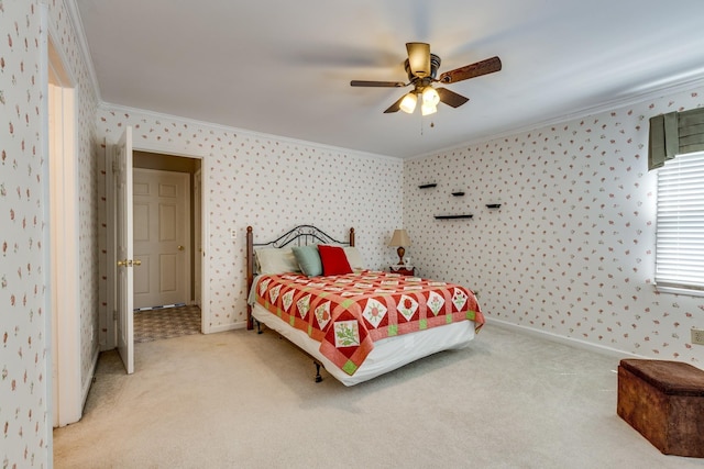 bedroom with ceiling fan, ornamental molding, and light colored carpet