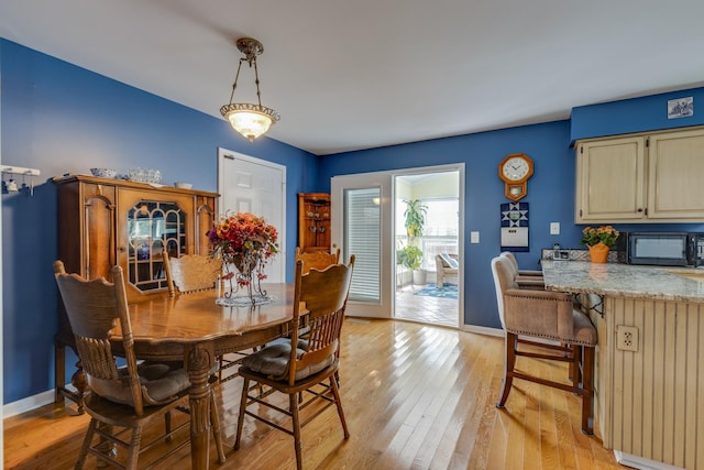 dining room featuring light wood-type flooring