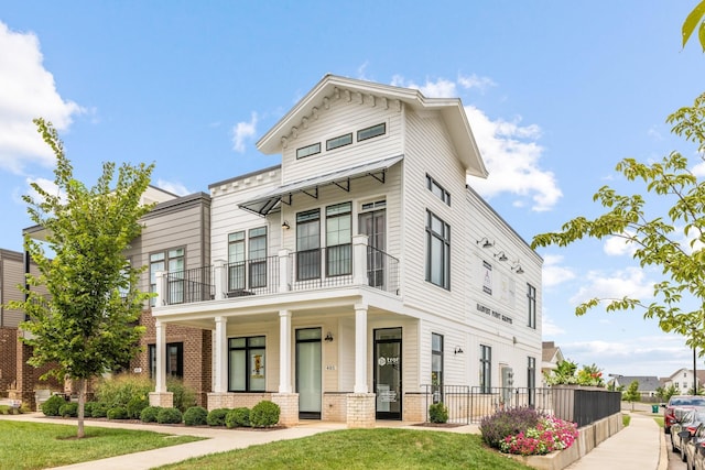 view of front of property with a front lawn