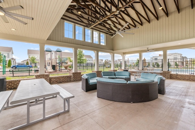 view of patio with ceiling fan and an outdoor living space