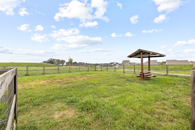 view of yard featuring a rural view