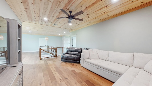 living room with ceiling fan, light hardwood / wood-style flooring, and wood ceiling