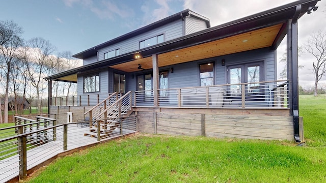 view of front of house featuring covered porch and a front yard