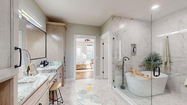 bathroom with a bathtub and vanity