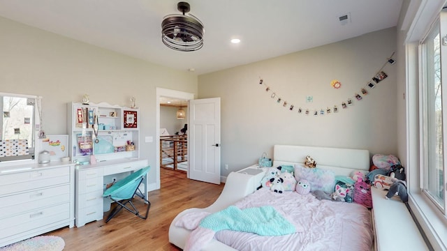 bedroom featuring light wood-type flooring