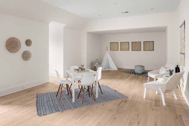 dining area with light hardwood / wood-style flooring