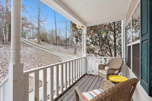 balcony featuring a porch