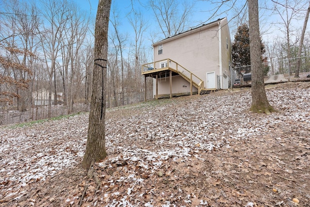 rear view of property with a deck