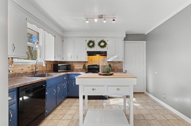 kitchen with sink, light tile patterned floors, blue cabinetry, white cabinetry, and black appliances